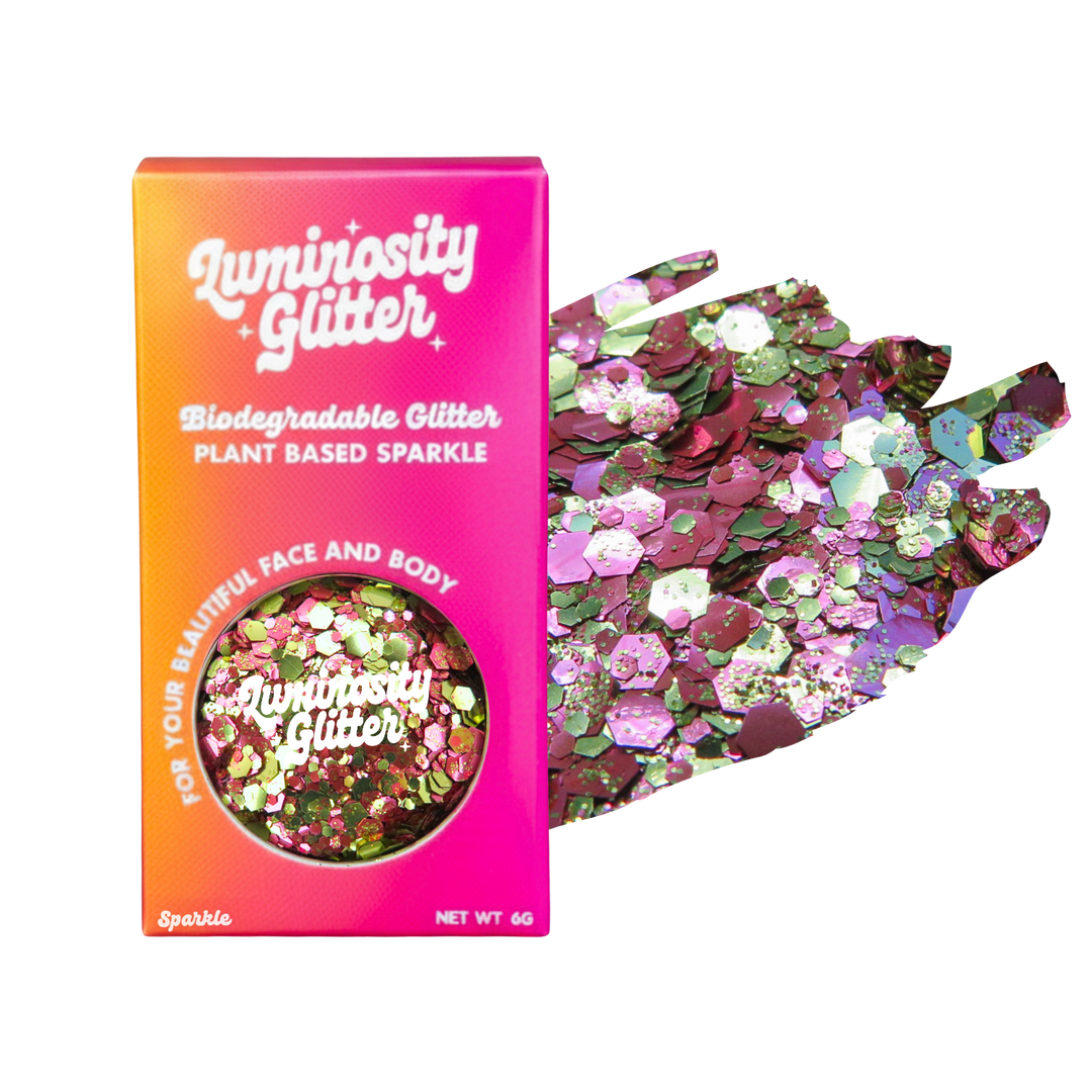 Pink and gold glitter in a bright Luminosity Glitter packaging box