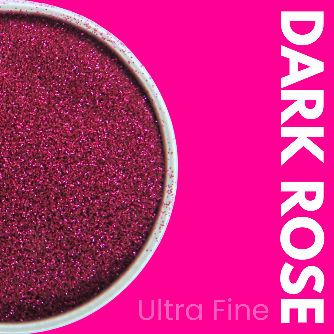 Dark rose ultra fine glitter in a container on a pink background with &