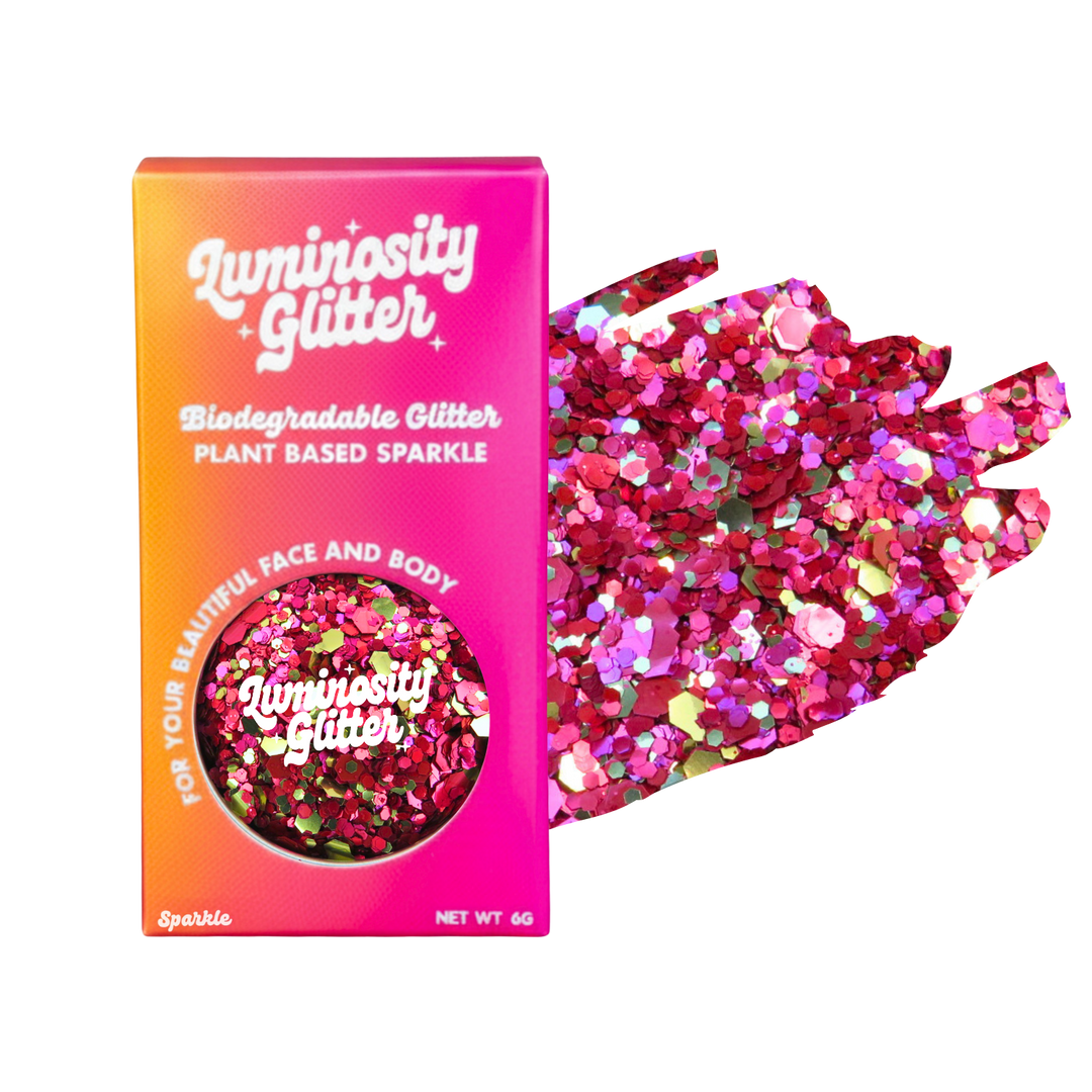 Luminosity Glitter packaging with biodegradable and plant-based glitter on a white background