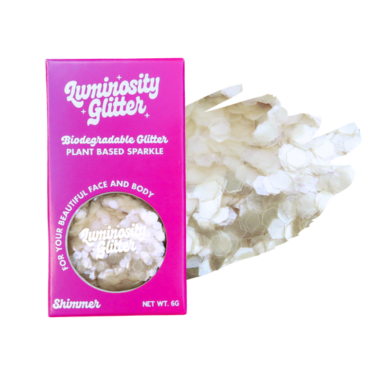Luminosity Glitter packaging with biodegradable glitter on a white background