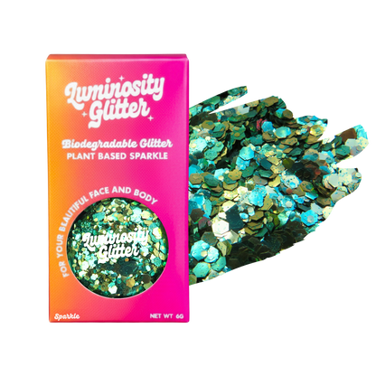 Luminosity Glitter packaging with green glitter on a white background