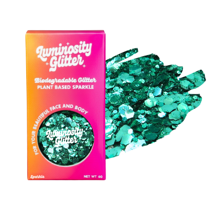 Luminosity Glitter packaging with green glitter on a white background