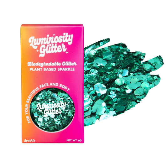 Luminosity Glitter packaging with green glitter on a white background