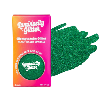 Luminosity Glitter packaging with green glitter on a white background