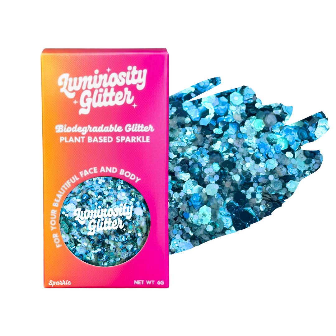Luminosity Glitter packaging with blue glitter on a white background