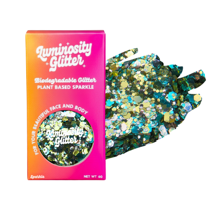 Luminosity Glitter packaging with biodegradable and plant-based sparkle, featuring a colorful gradient.