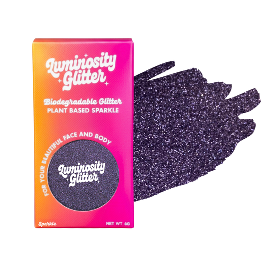 Luminosity Glitter packaging with a sample of purple glitter on a white background