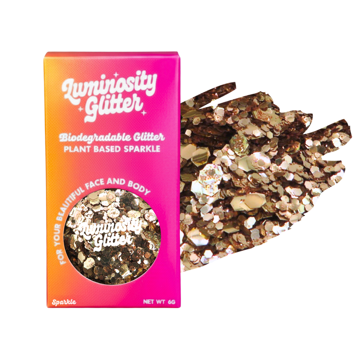 Luminosity Glitter packaging with biodegradable and plant-based glitter on a white background