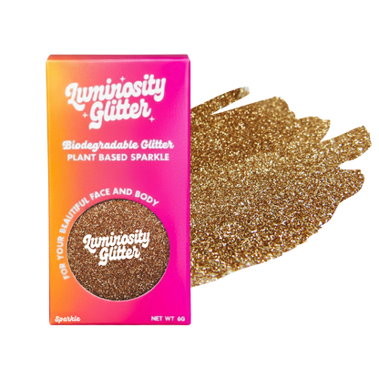 Luminosity Glitter packaging with gold glitter swatch on a white background