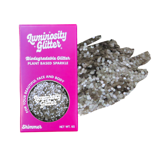 Luminosity Glitter packaging with a sample of glitter on a white background