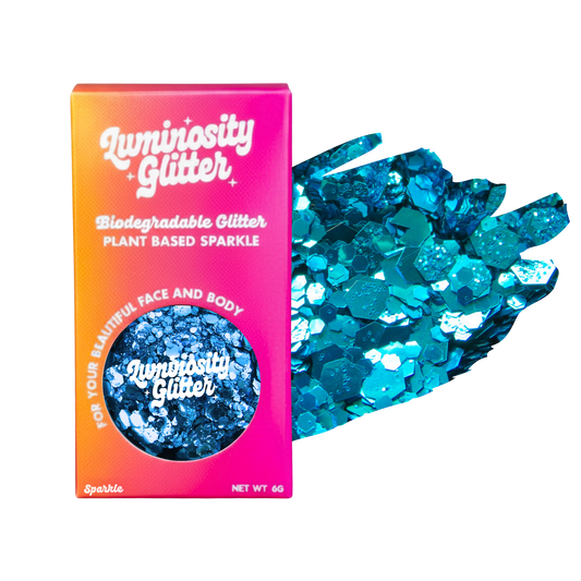 Luminosity Glitter packaging with blue glitter on a white background