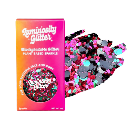 Luminosity Glitter packaging with biodegradable and plant-based glitter on a white background