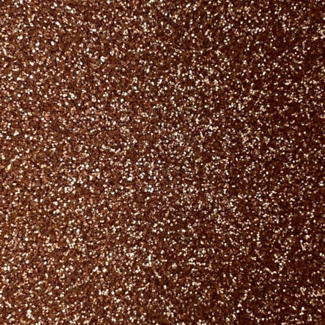 Close-up of rose gold fine eco glitter texture.