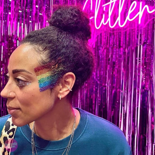 Fine rainbow glitter makeup look created with Luminosity fine eco glitter