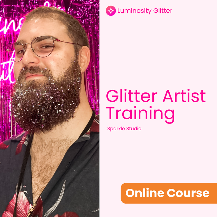 Man with glittery beard in front of pink glittery background with &