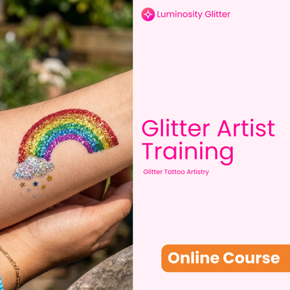 Glitter tattoo of a rainbow on a person's arm with Luminosity Glitter branding.