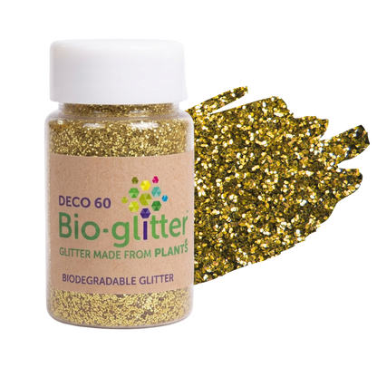 A bottle of craft Bio-glitter DEC0 60 biodegradable glitter with a white cap and kraft paper label, shown next to a textured gold glitter swatch on a white background.