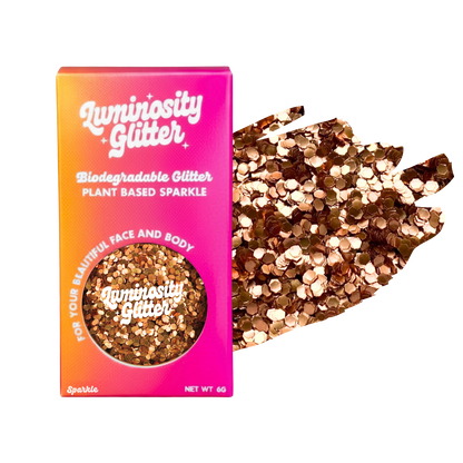 Luminosity Glitter packaging with biodegradable glitter on a white background