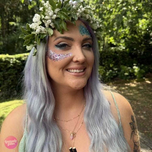 Pink and silver face glitter makeup look