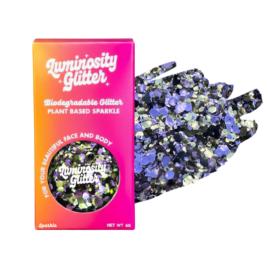 Luminosity Glitter packaging with biodegradable and plant-based sparkle on a white background