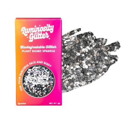 Luminosity Glitter packaging with biodegradable and plant-based sparkle on a white background