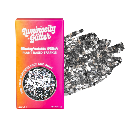 Luminosity Glitter packaging with biodegradable and plant-based sparkle on a white background